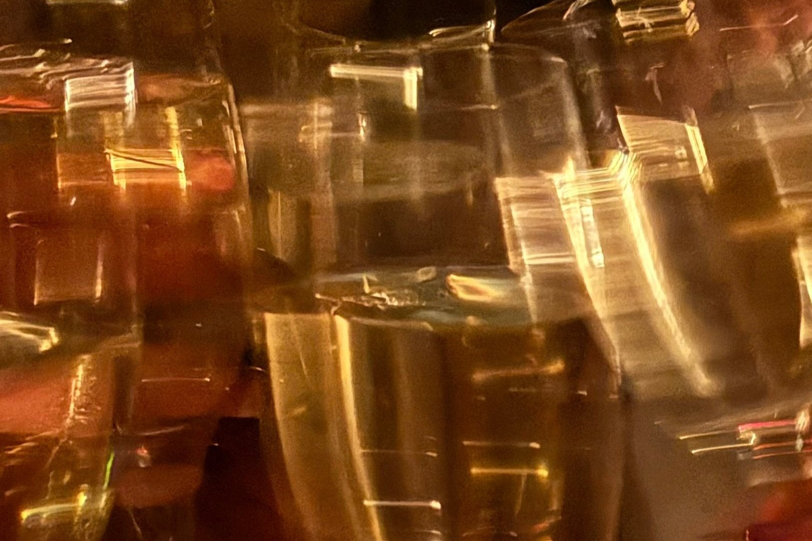 blurry cheers of champagne flutes fill with La Rassi NA Sparkling wine.