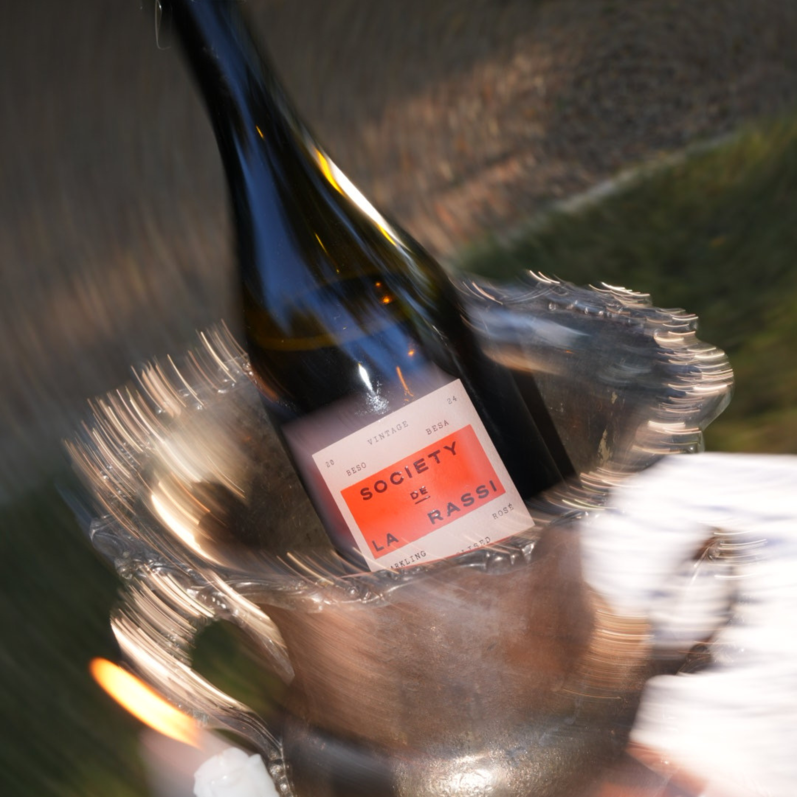 bottle of rose in a silver champagne bucket